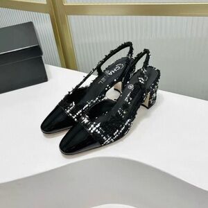 CHANEL Black and White Sequin Heels